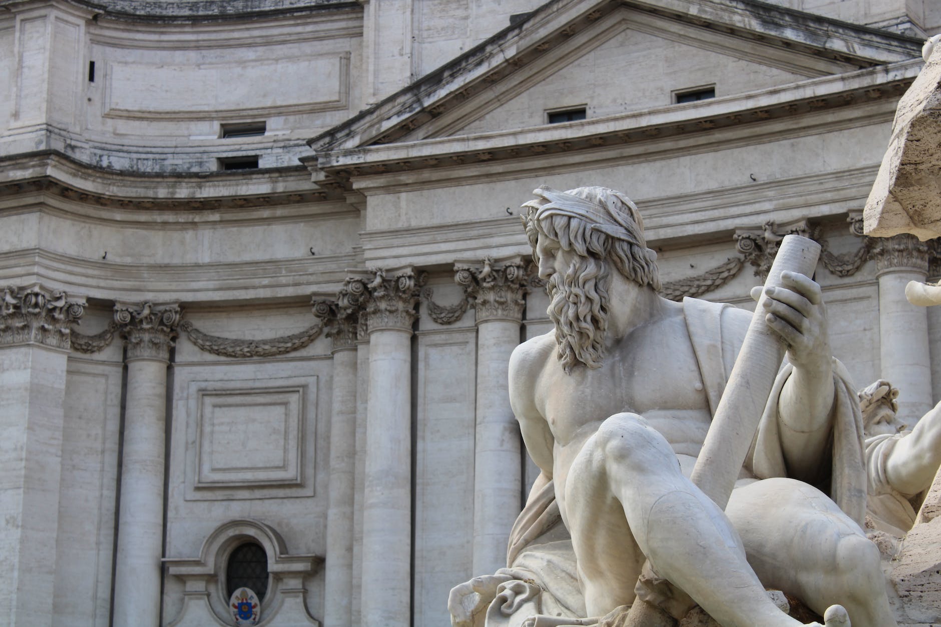 zeus statue in bernini s fountain of the four rivers in rome italy
