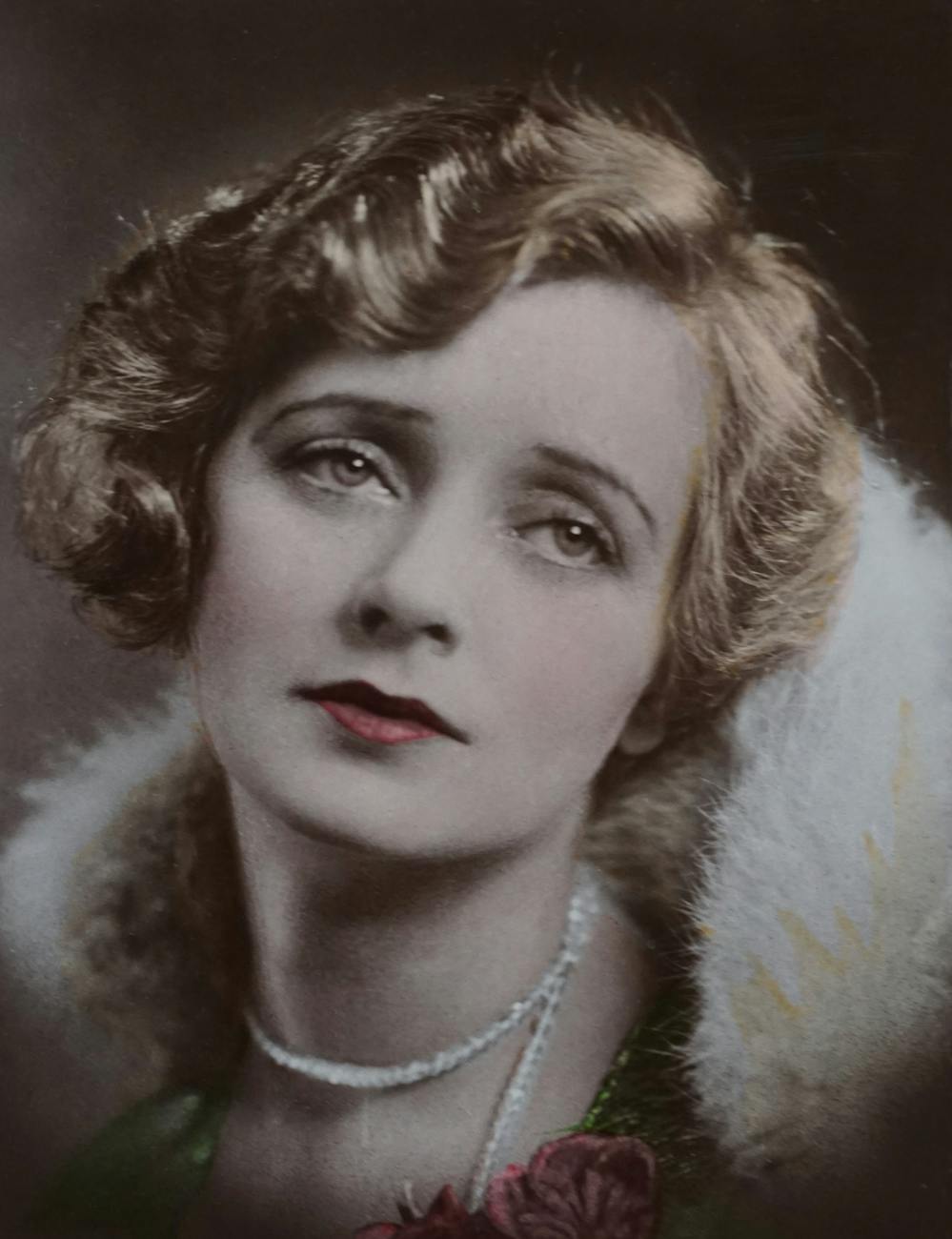portrait of a beautiful woman wearing fur coat