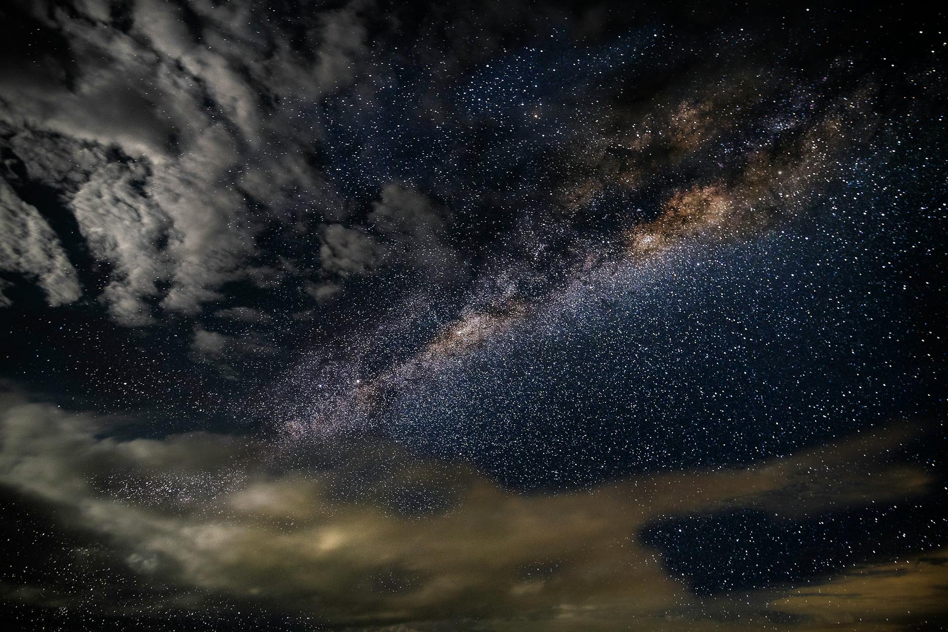 stars and clouds at nighttime