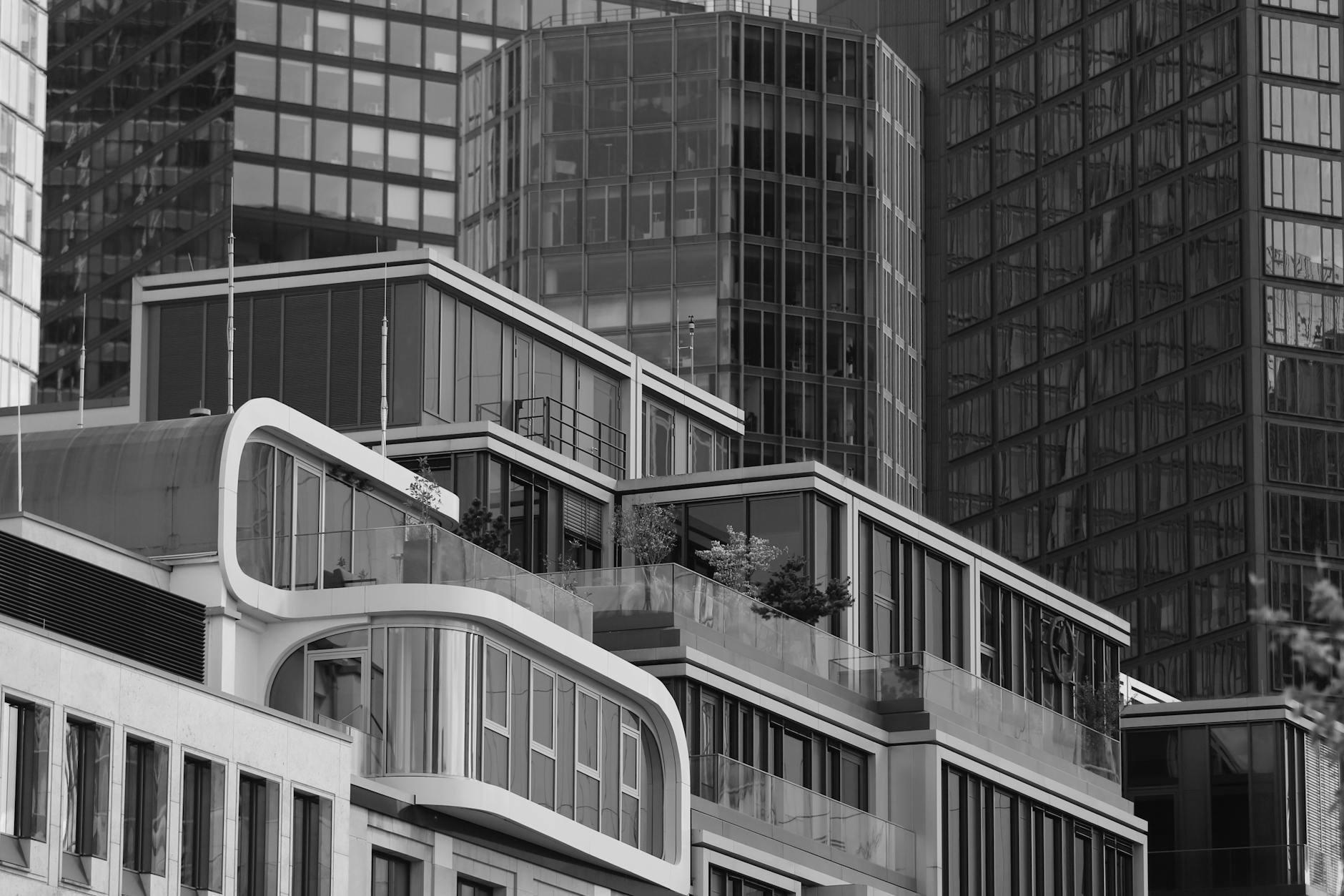 windows of buildings in downtown in black and white